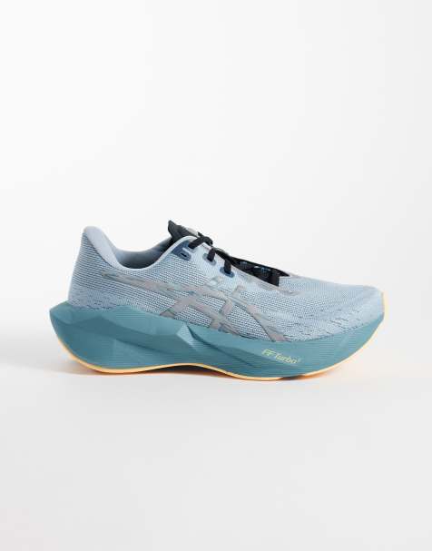 Asics Novablast 6 Lite-Show zapatillas de running grises con detalle naranja - view 1