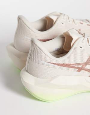 Asics Novablast 6 running trainers in rose and yellow