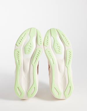 Asics Novablast 6 running trainers in rose and yellow