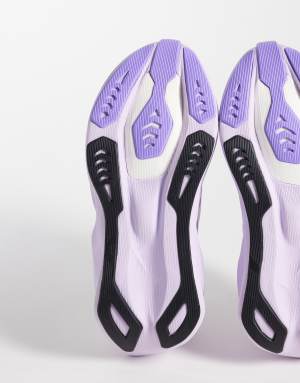 Asics Novablast 6 running trainers in white and lilac