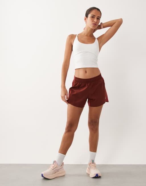Asics running core 4inch shorts in burnt red, 3 of 5