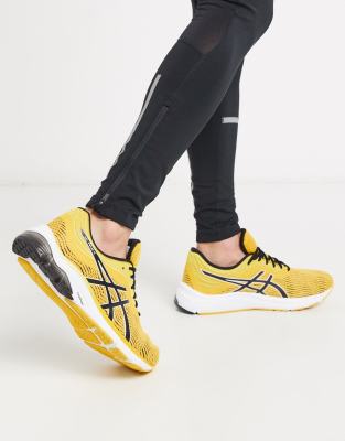tuta asics nera arancione