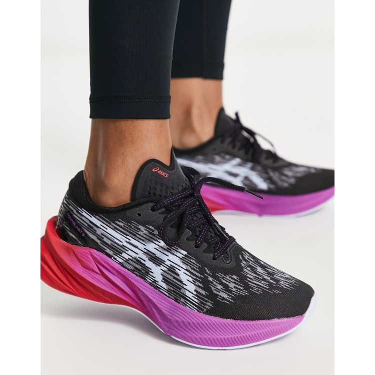 Asics Running Novablast 3 trainers in black and pink