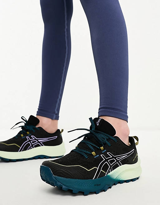 asos.com | Asics Running – Trabuco 11 – Sneaker in Marineblau mit farblich abgesetzter Sohle