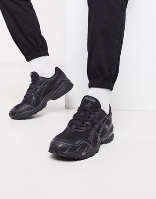 Asics SportStyle 1090 trainers in black 
