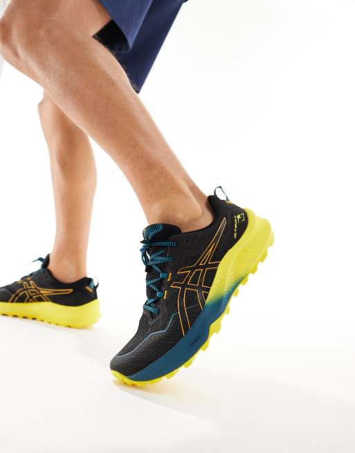 Asics – Trabuco 11 – Laufschuhe in Schwarz und Gelb