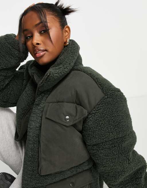 Monki oversized puffer jacket with borg store detailing in black