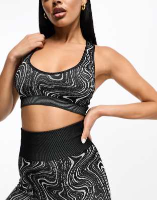 ASOS 4505 Seamless jacquard longline light support sports bra in swirl print - ASOS Price Checker