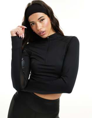 ASOS 4505 - Crop top a maniche lunghe nero con pannelli in rete e zip corta