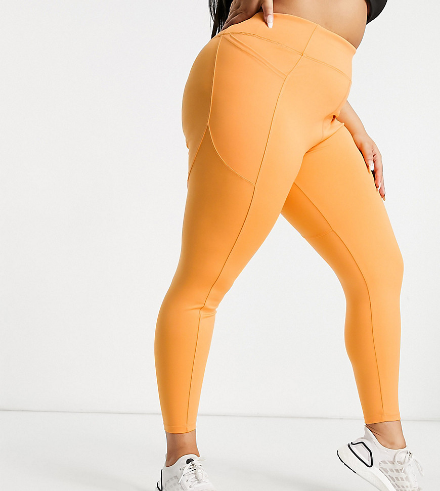 ASOS 4505 Curve icon legging with butt-sculpting seam detail and pocket-Orange