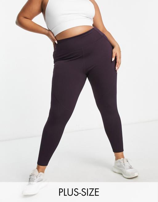 ASOS 4505 Curve – Leggings mit figurformendem Saumdetail am Bauch und Tasche 