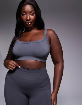 ASOS 4505 ASOS 4505 Curve sculpting seamless medium support sports bra in dark grey