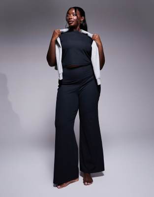 Asos Design 4505 Curve Soft Touch Rib Slim Kick Yoga Legging In Black