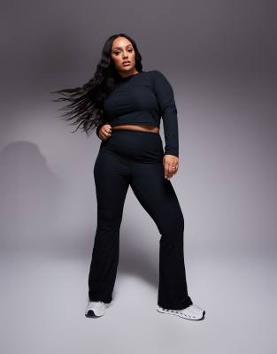 ASOS 4505 Curve - Weiche, gerippte Tanzhose in Schwarz mit weitem Bein