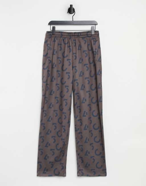 ASOS 4505 – Gerade geschnittene Jogginghose mit Logoprint