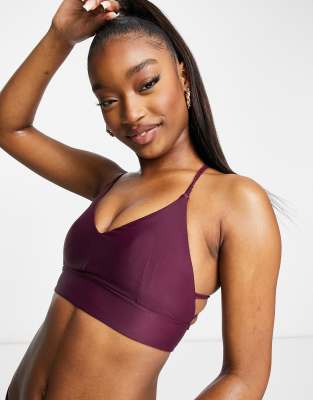 ASOS 4505 zip front medium support sports bra with back graphic in