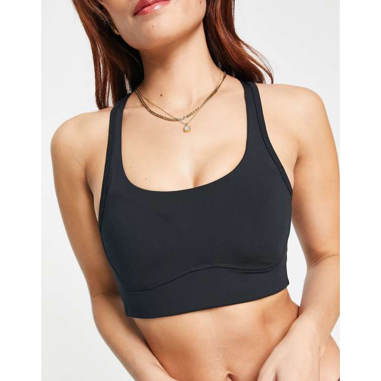 ASOS 4505 medium support sports bra in cracked leather effect in black