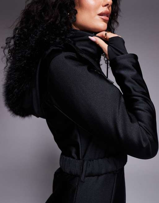 ASOS 4505 Hourglass Ski soft shell belted ski suit with slim kick leg and faux fur hood in black gloss