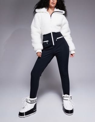 ASOS 4505 Hourglass Ski suit with faux fur panels and skinny leg in black and white-Multi