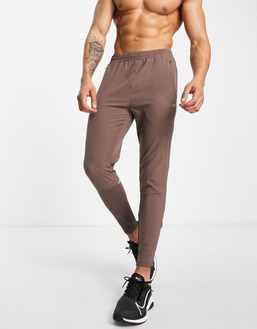 ASOS 4505 hybrid training track pants with woven panels ASOS