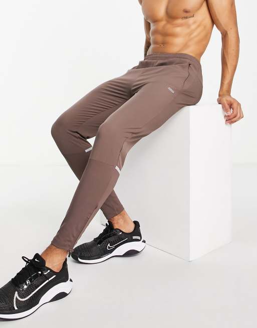 ASOS 4505 - Hybride fitness-joggingbroek met geweven inzetstukken