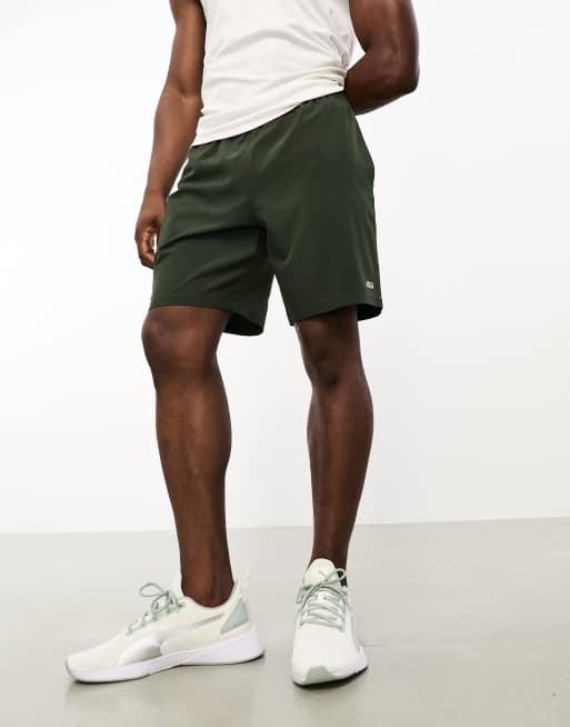 ASOS DESIGN slim nylon shorts with piping detail in khaki