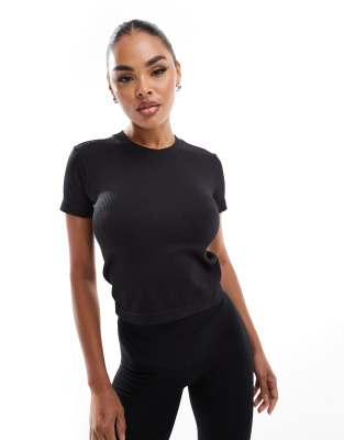 ASOS 4505 - Icon - Nahtloses T-Shirt in geripptem Schwarz mit knappem Schnitt