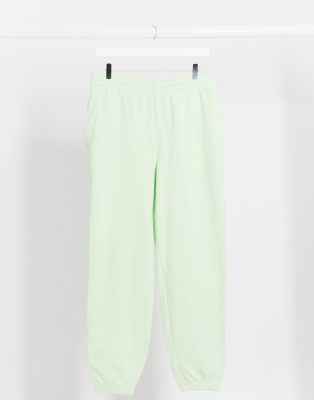 nike women's sportswear tracksuit joggers rust pink