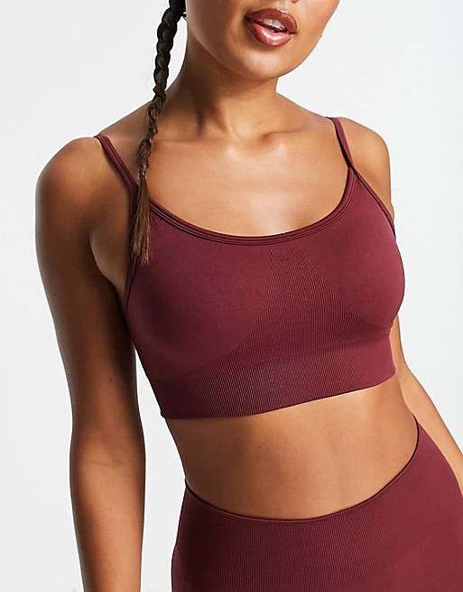 ASOS 4505 Icon seamless light support sports bra with removable padding in  burgundy