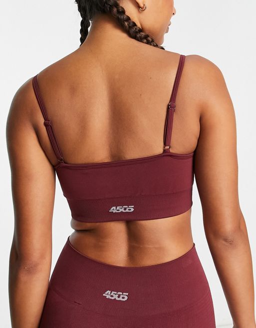ASOS 4505 medium support sports bra with removable padding in