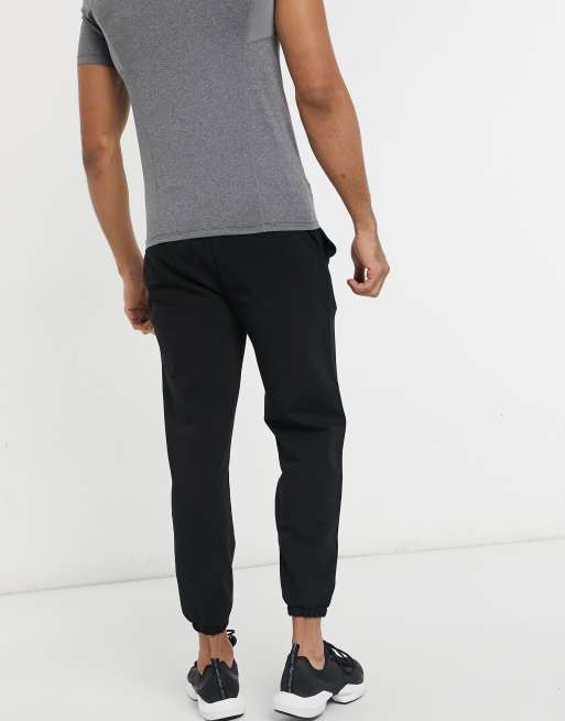 ASOS 4505 - Icon - Trainingsjoggingbroek met toelopende pasvorm in zwart , 2 van 4