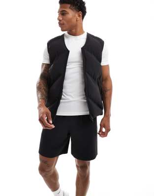 4505 insulated running puffer vest with zip phone pockets in black