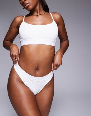 ASOS 4505 ASOS 4505 Intimate seamless rib active bra with adjustable straps in white