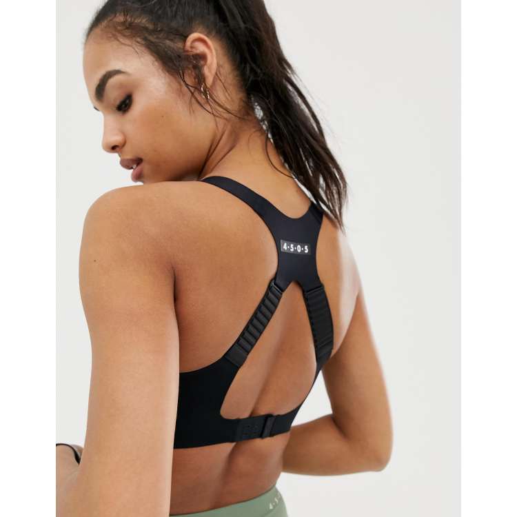 ASOS 4505 medium support sports bra in cracked leather effect in black