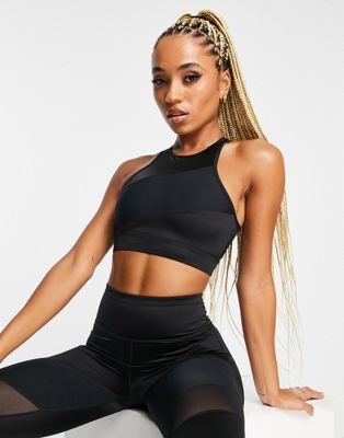 ASOS 4505 medium support sports bra with racer back in black matte and shine