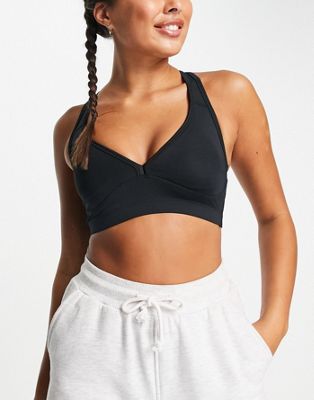 ASOS 4505 mid impact sports bra with removable padding