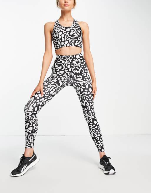 ASOS 4505 medium support sports bra in animal print