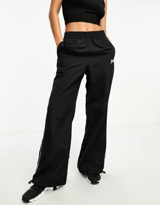 ASOS 4505 Running Club woven track pant with graphic in black