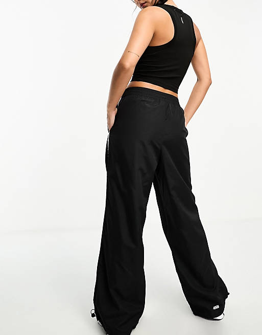 https://images.asos-media.com/products/asos-4505-running-club-woven-track-pant-with-graphic-in-black/205056296-4?$n_640w$&wid=513&fit=constrain
