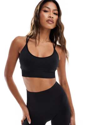 Asos Design 4505 Seamless Medium Support Sports Bra With Removable Padding In Black