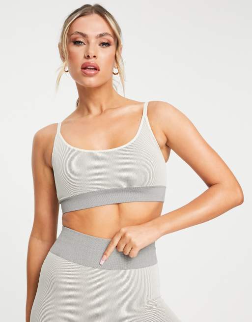 ASOS 4505 Seamless rib light support sports bra with removable padding in white and gray, 3 of 4