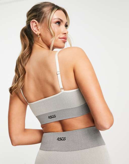 ASOS 4505 seamless rib light support sports bra with removable padding in white and grey, 4 of 4