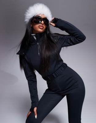 4505 Ski belted ski suit with slim kick leg and faux fur hood in black