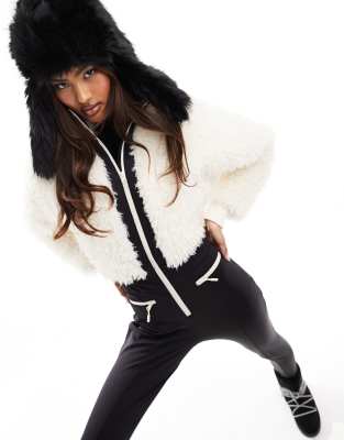 ASOS 4505 Ski suit with faux fur panels and skinny leg in black and white - ASOS Price Checker