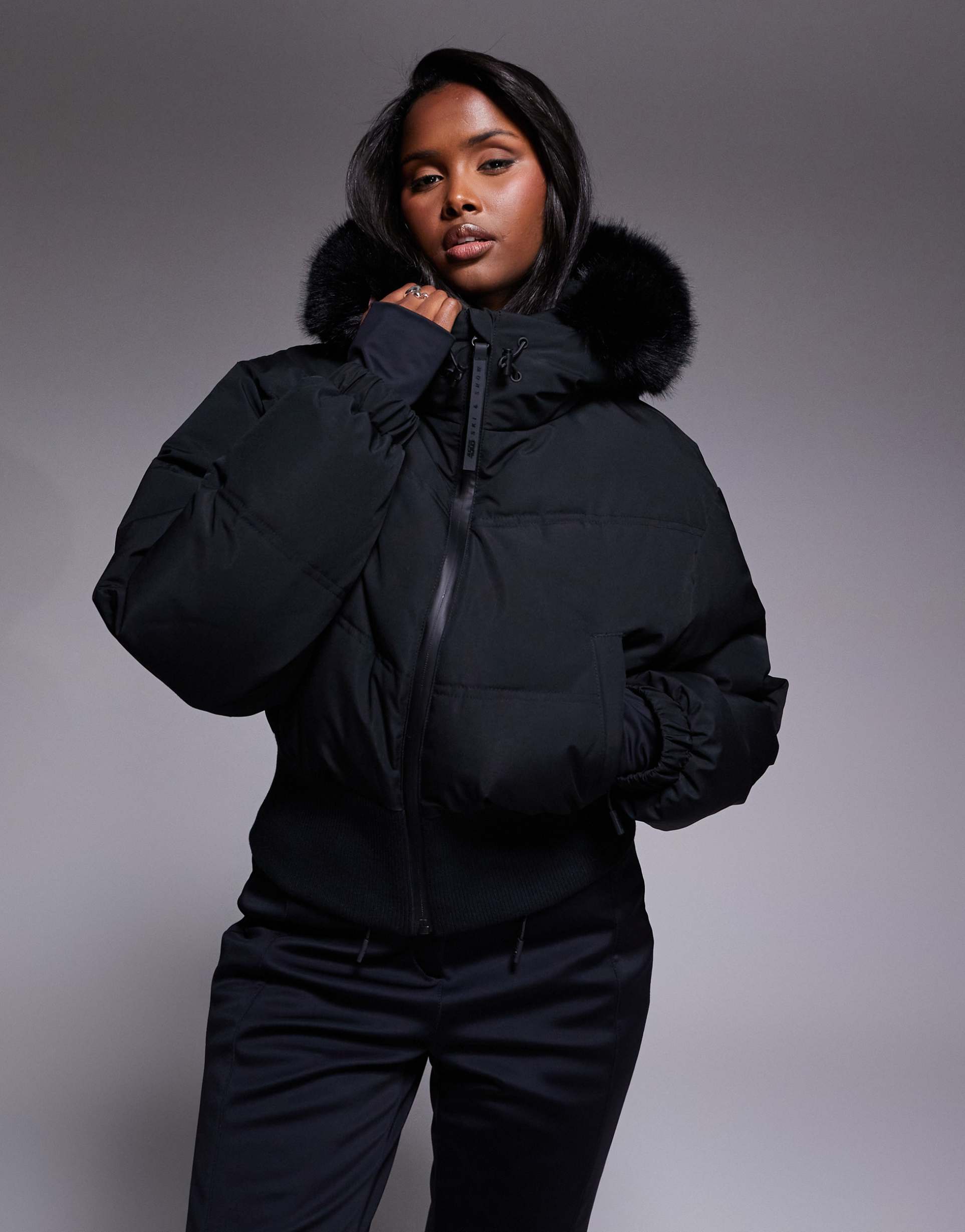asos 4505 ski cropped insulated ski bomber jacket with faux fur hood in black