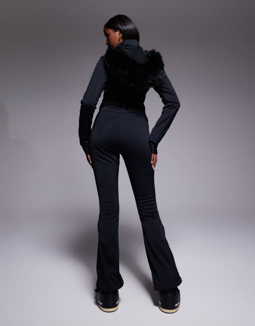 ASOS 4505 Ski soft shell belted ski suit with slim kick leg and faux fur hood in black