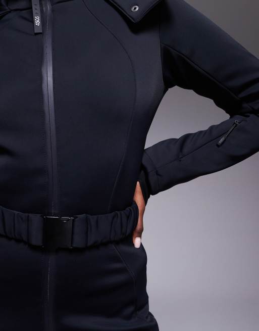 ASOS 4505 Ski soft shell belted ski suit with slim kick leg and faux fur hood in black