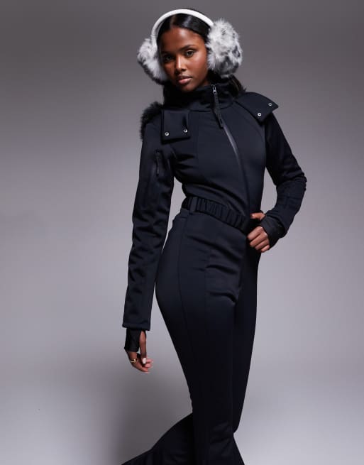 ASOS 4505 Ski soft shell belted ski suit with slim kick leg and faux fur hood in black