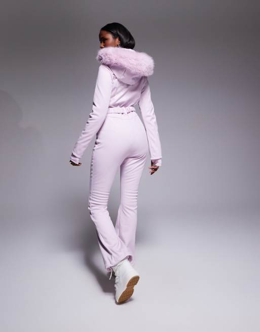 ASOS 4505 Ski soft shell belted ski suit with slim kick leg and faux fur hood in pink