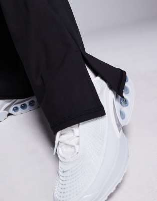 Asos 4505 Soft Touch Slim Kick Yoga Legging With Split Hem In Black